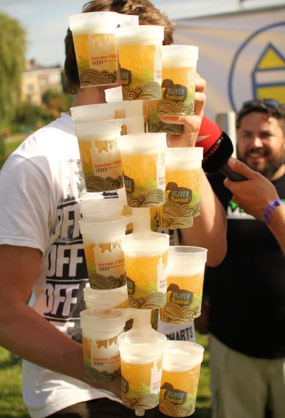 Festival goers with eco cups